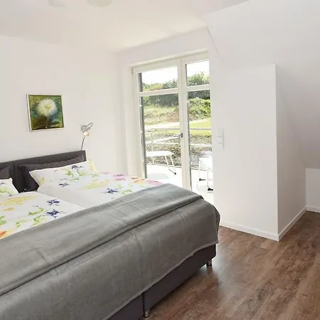 Casa de Férias Exklusive Reetdach-villa Ostseefrische *